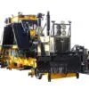 Side profile of a M7 Ballast regulator from Nordco with a snow plow attachment on the front with a transparent background