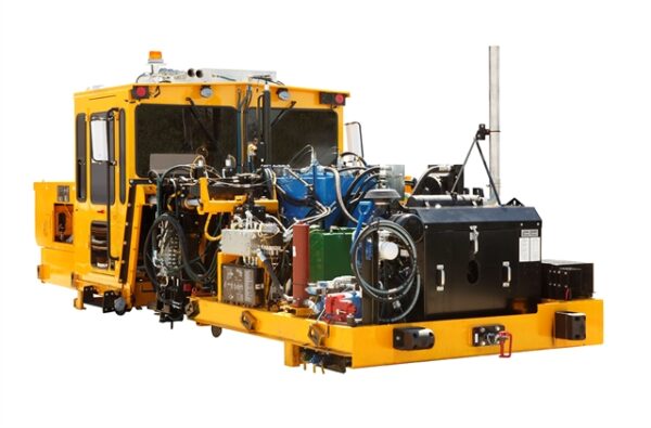 A frontal shot of a SE Spiker from Nordco showing the engine and components